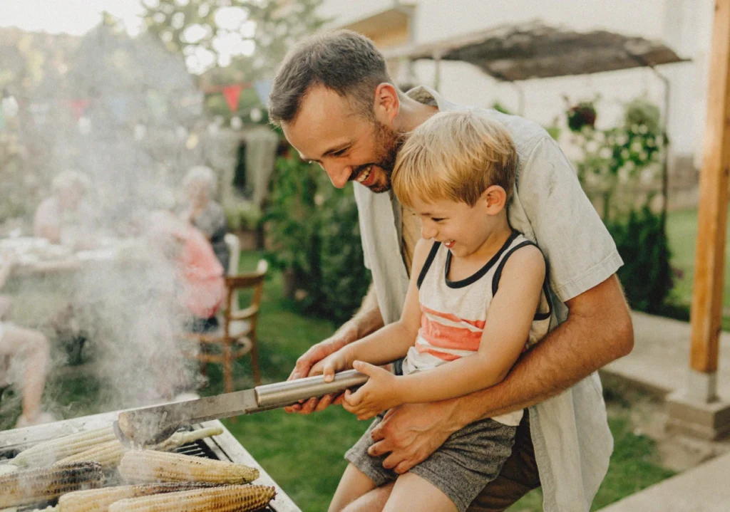 Father and son playing